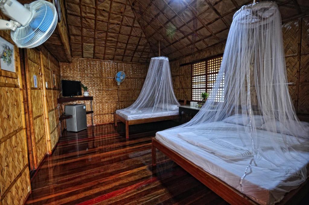 Villa de Pico Highland Beach Resort Puerto Galera Habitación foto