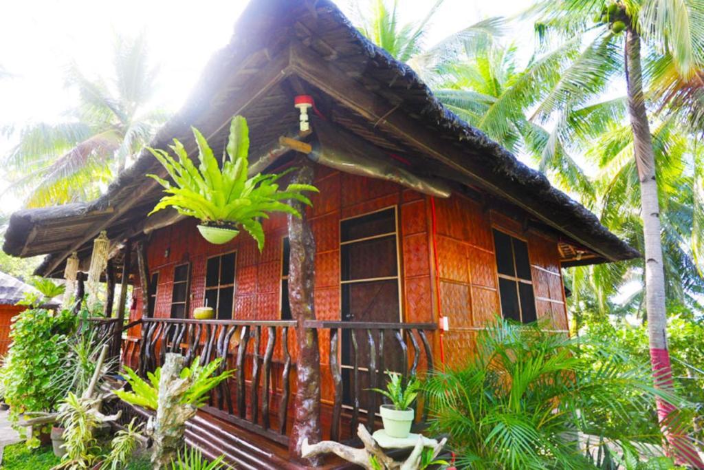 Villa de Pico Highland Beach Resort Puerto Galera Habitación foto